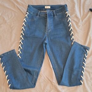 Women's Blue Jeans with White Lace-Up Detail